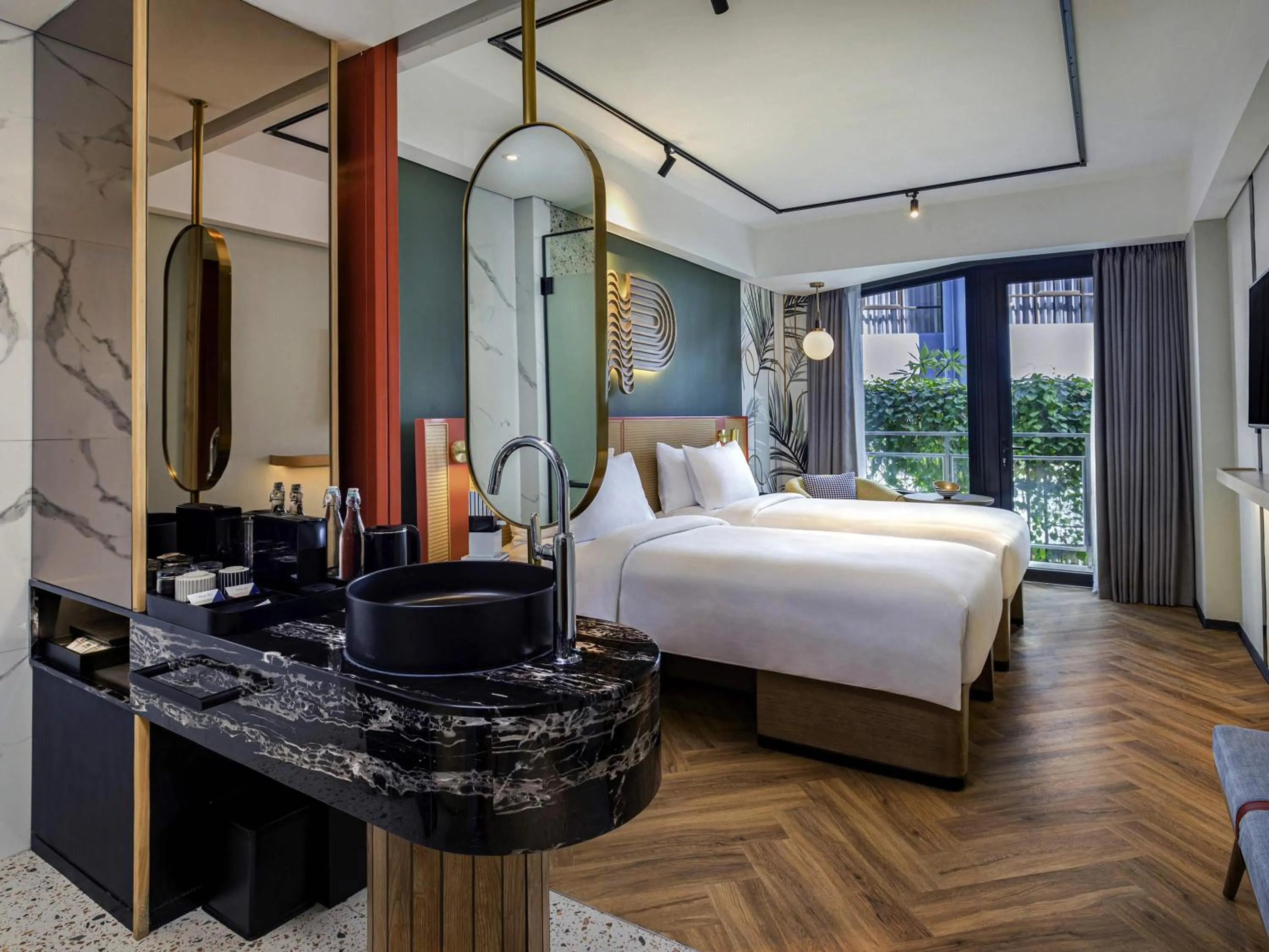 Comfort Twin Room with Balcony with Unlimited Self-Service Laundry in Tribe Bali Kuta Beach