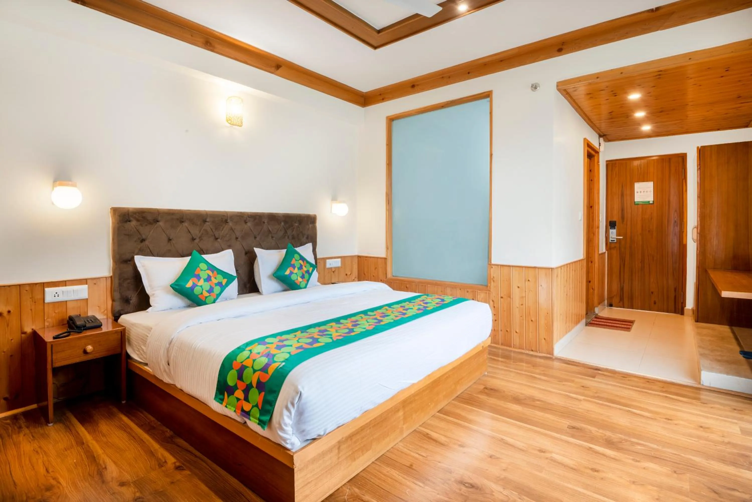 Deluxe Room With Balcony & Mountain View in Treebo Premium Sattva With Mountain View
