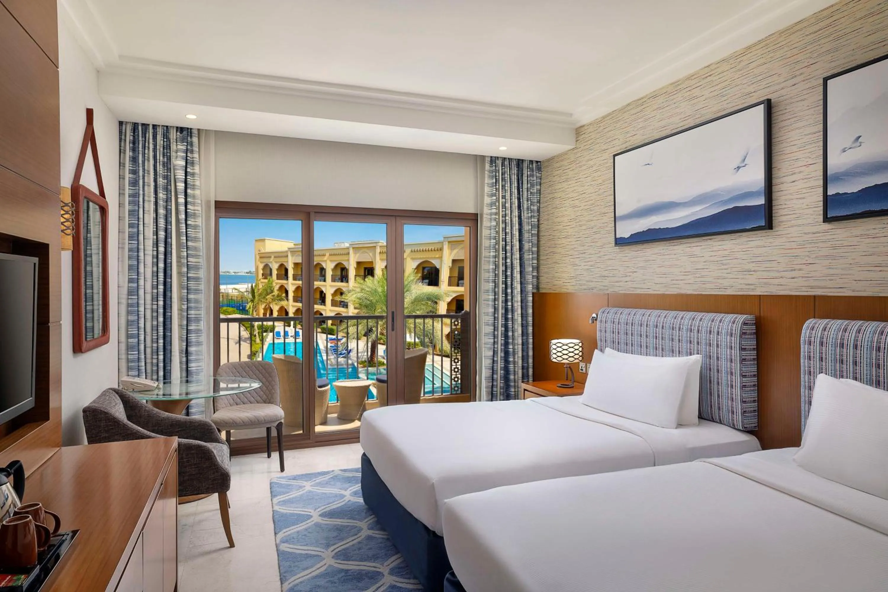 Twin Guest Room with Balcony in DoubleTree by Hilton Resort & Spa Marjan Island