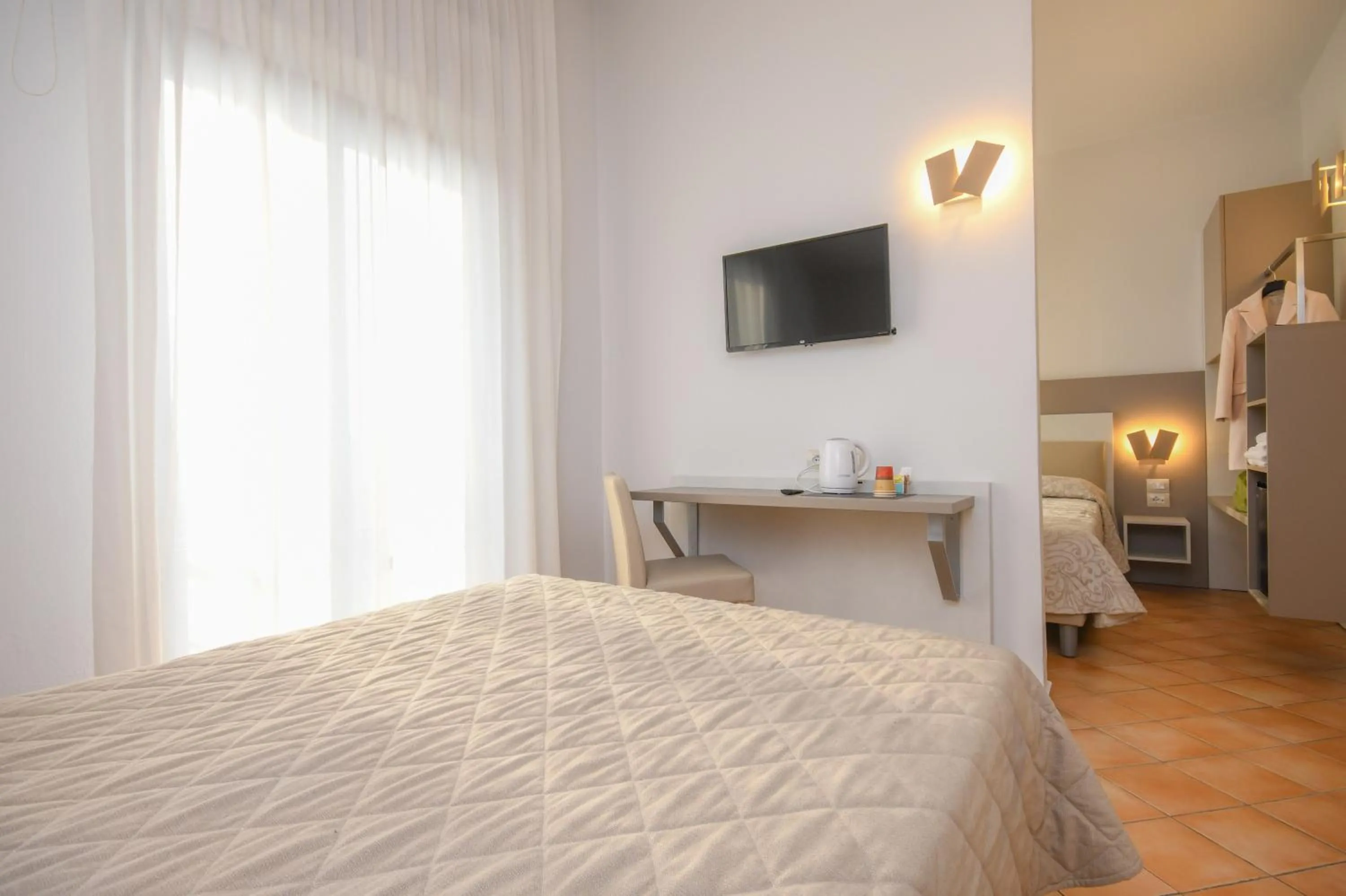 Quadruple Room in Hotel Riel