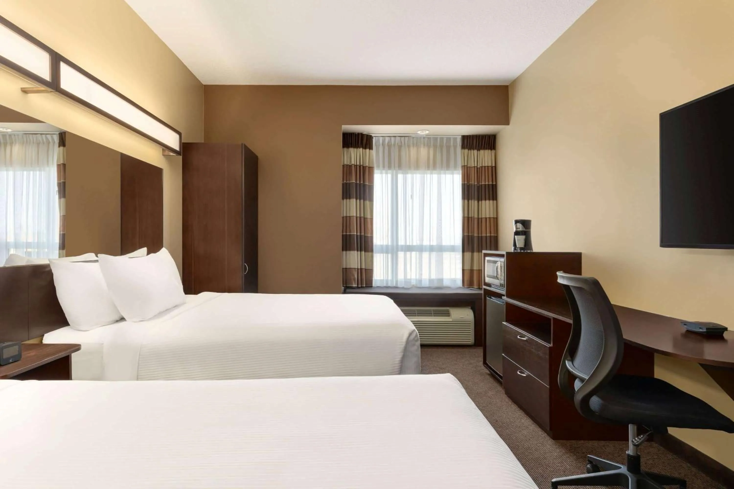 Queen Room with Two Queen Beds and Roll-In Shower - Mobility Accessible/Non-Smoking in Microtel Inn and Suites by Wyndham Weyburn