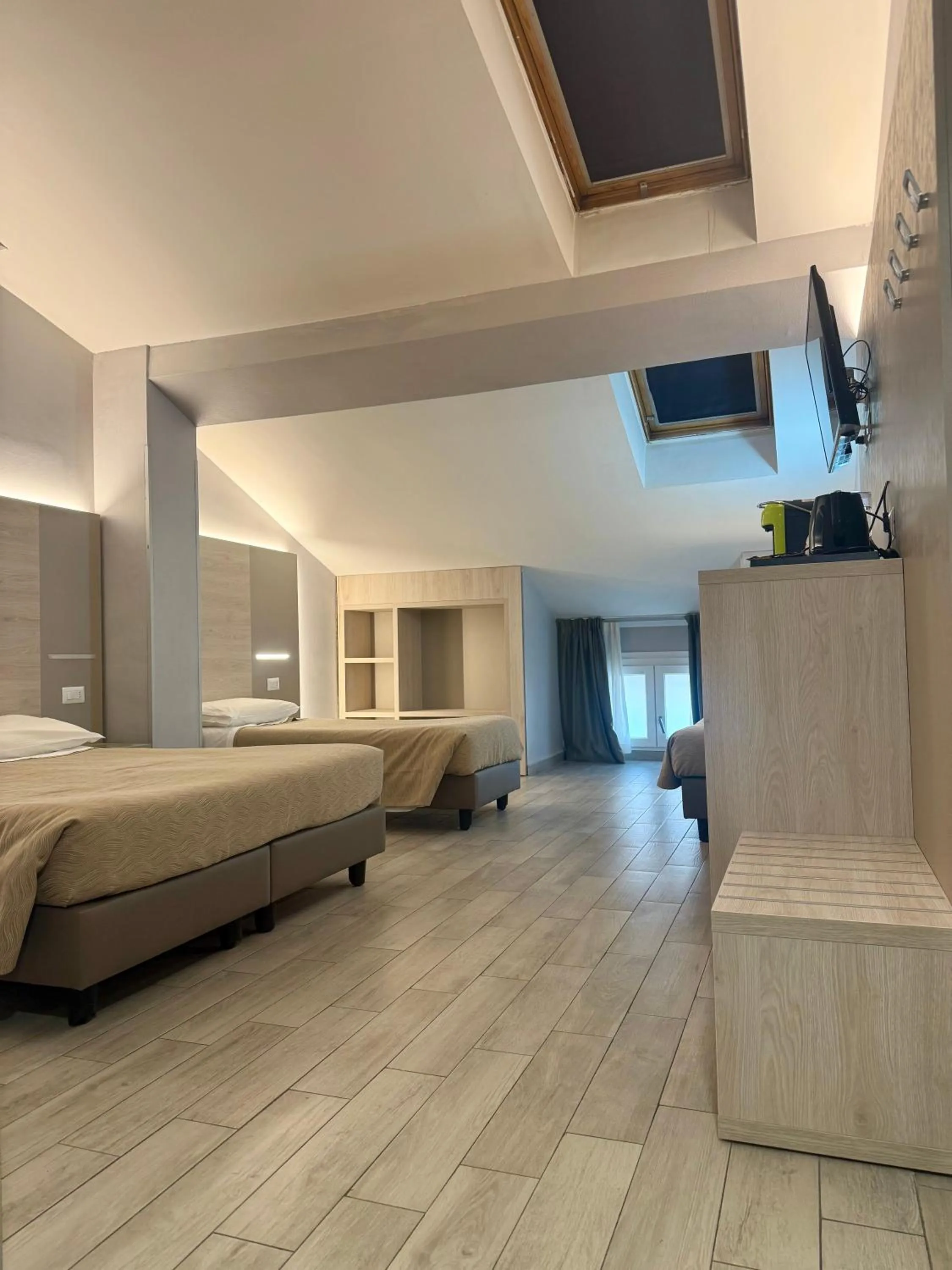 Quadruple Room - Attic in Hotel Miramonti
