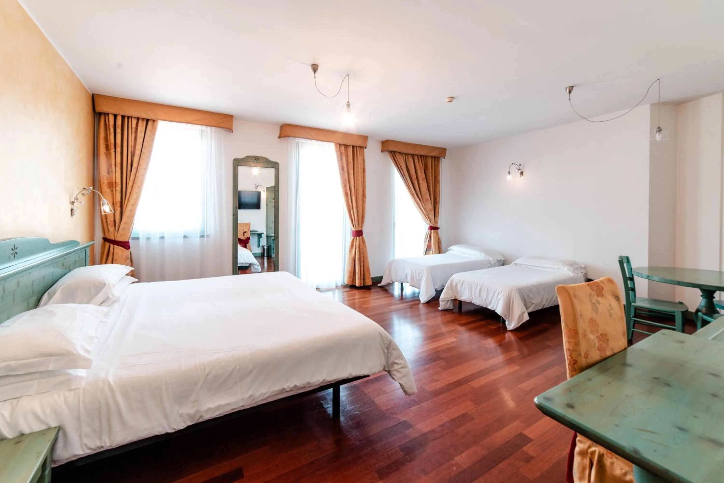 Quadruple Room - single occupancy in Hotel Residence Montelago