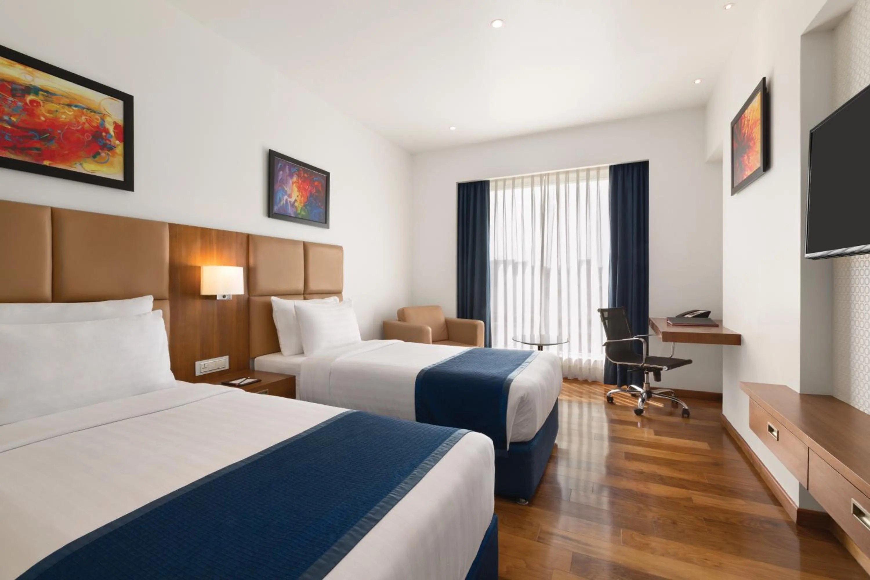 Deluxe Twin Room - single occupancy in Ramada Encore Domlur Bangalore