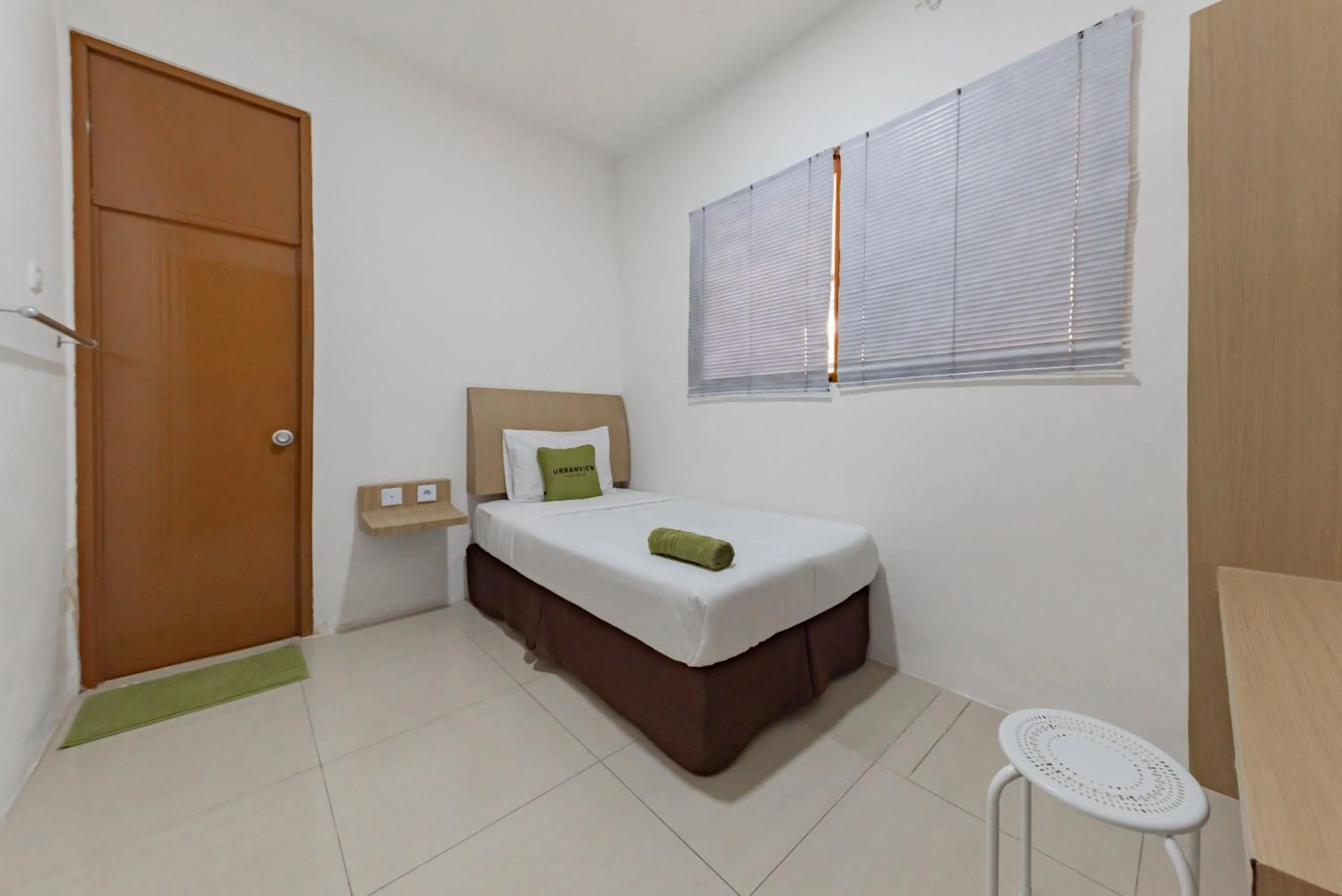 Single Room in Urbanview Hotel Cozy Samarinda by RedDoorz