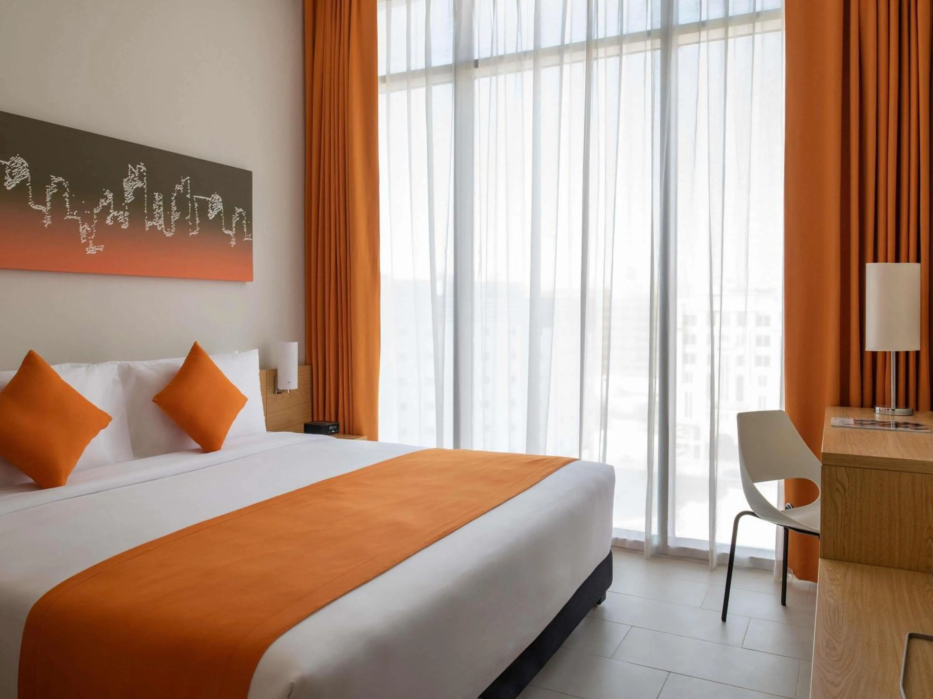 One Bedroom Apartment with One King Bed and One Sofabed in Adagio Doha