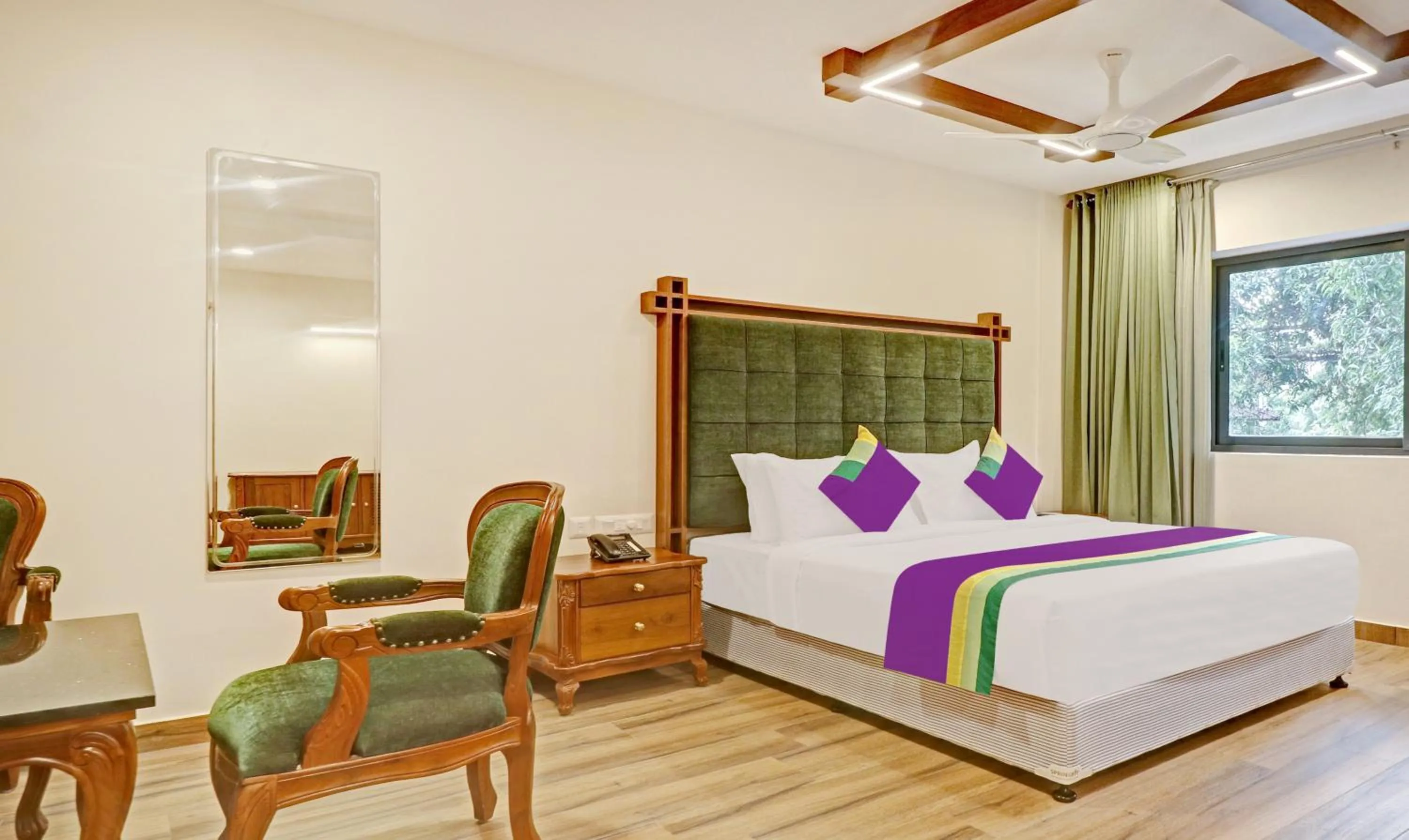 Deluxe Double Room - single occupancy in Treebo Premium Vahada 7 Minutes Drive From Ambalapuzha Sree Krishna Swamy Temple