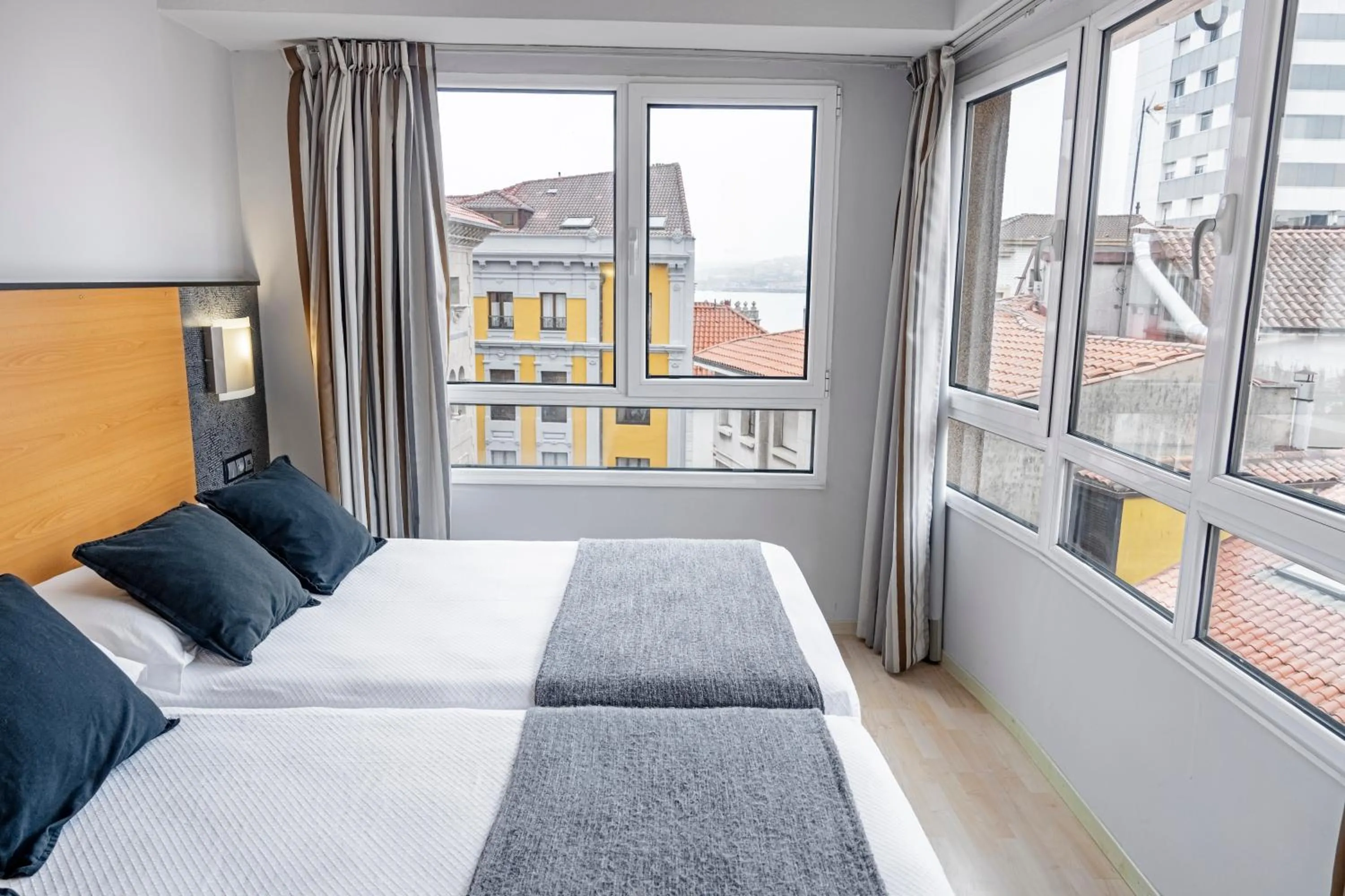  2 single beds in Hotel Faranda Pathos Gijón, Ascend Hotel Collection