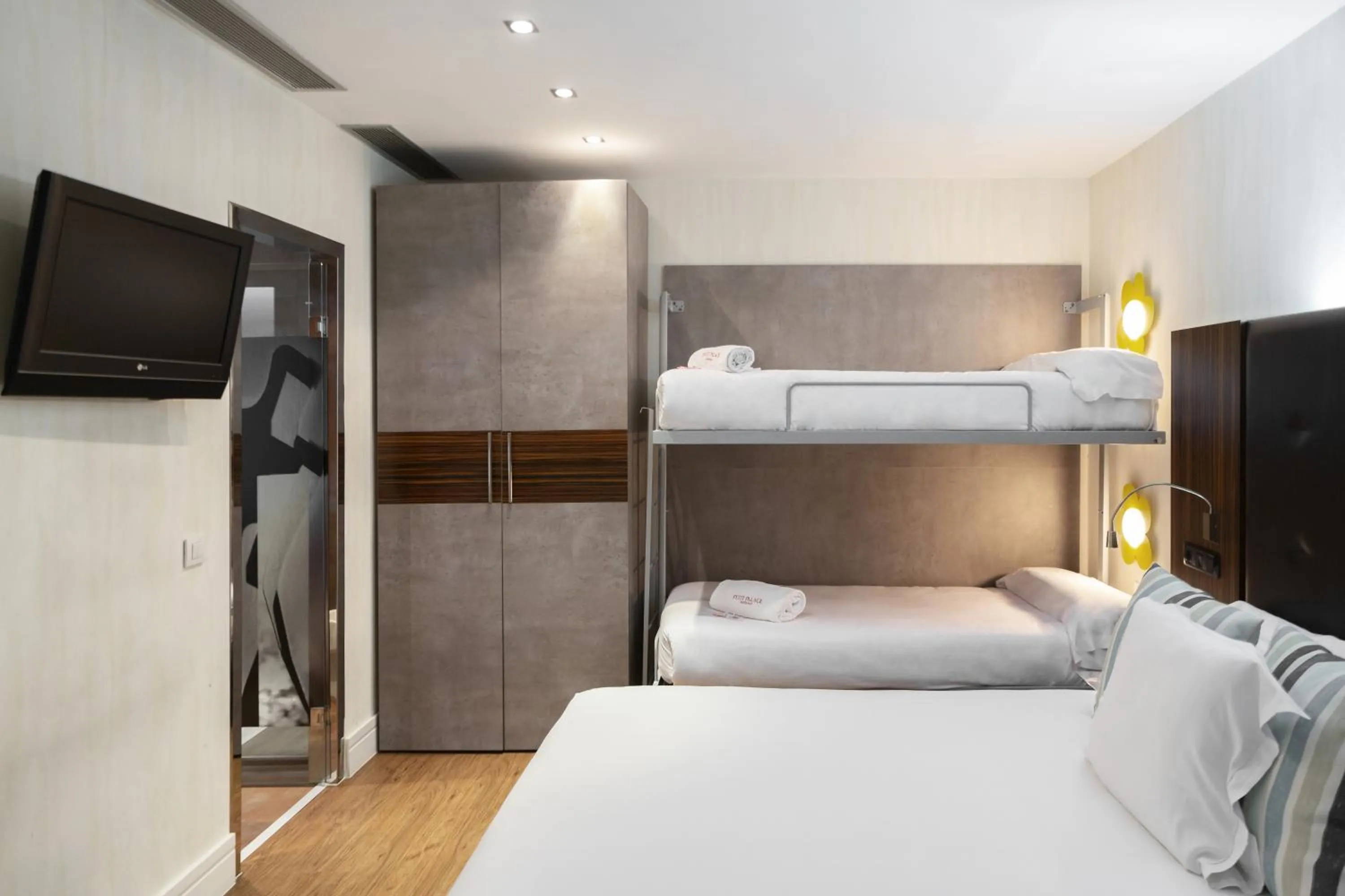 Quadruple Room Interior ( 4 Adults )   in Petit Palace Tamarises