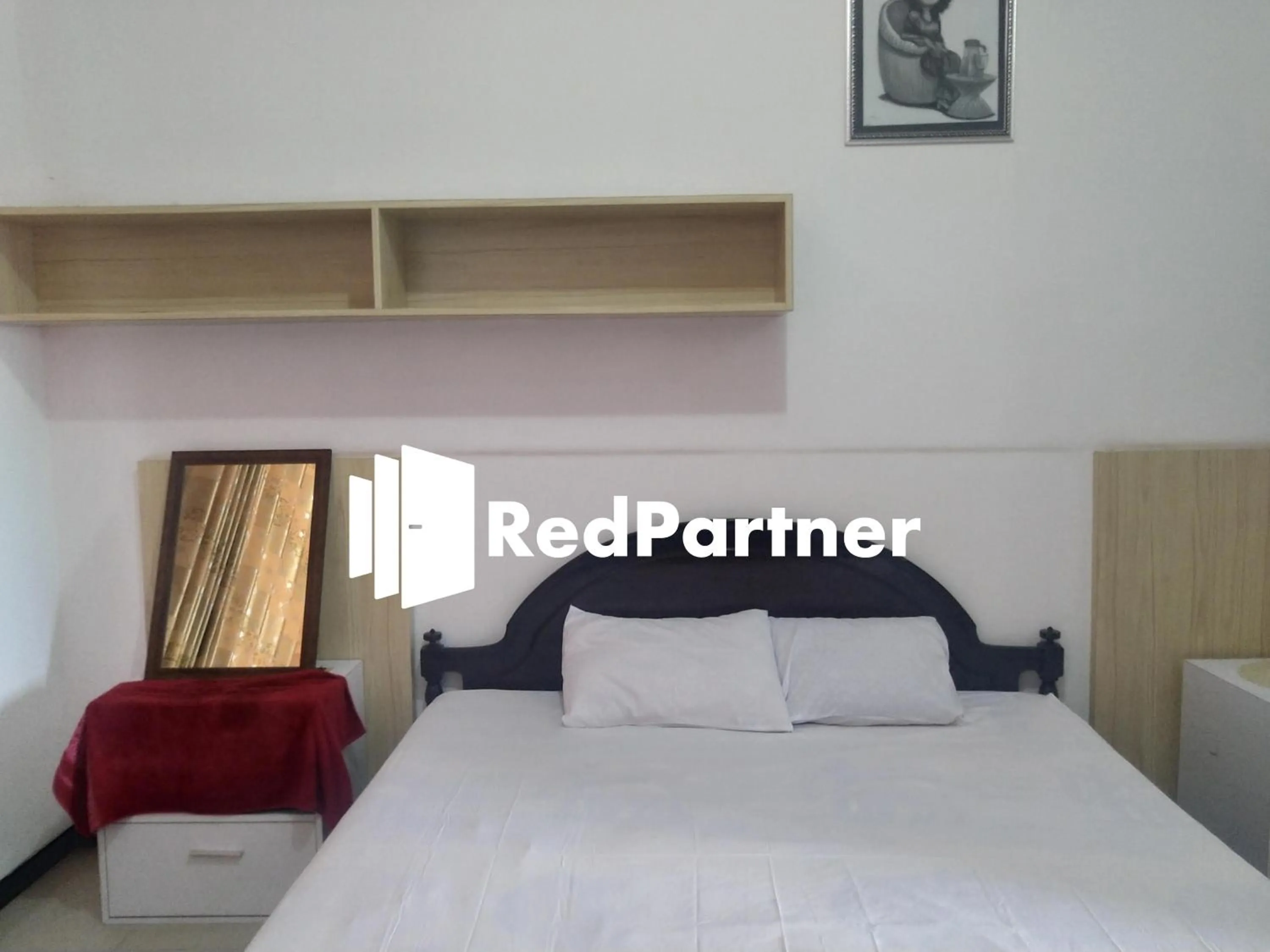 Twin Room in Riyani Residence At Jalan Ahmad Yani Pemalang Mitra RedDoorz